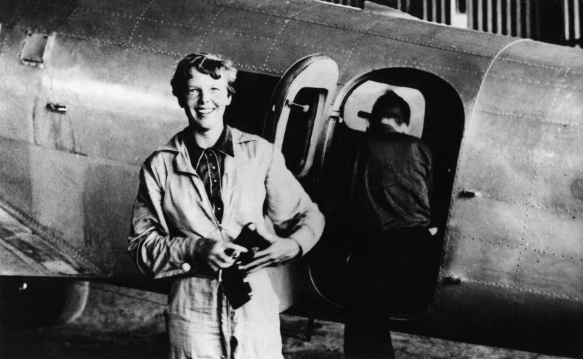 Earhart getting ready for one of her flights.