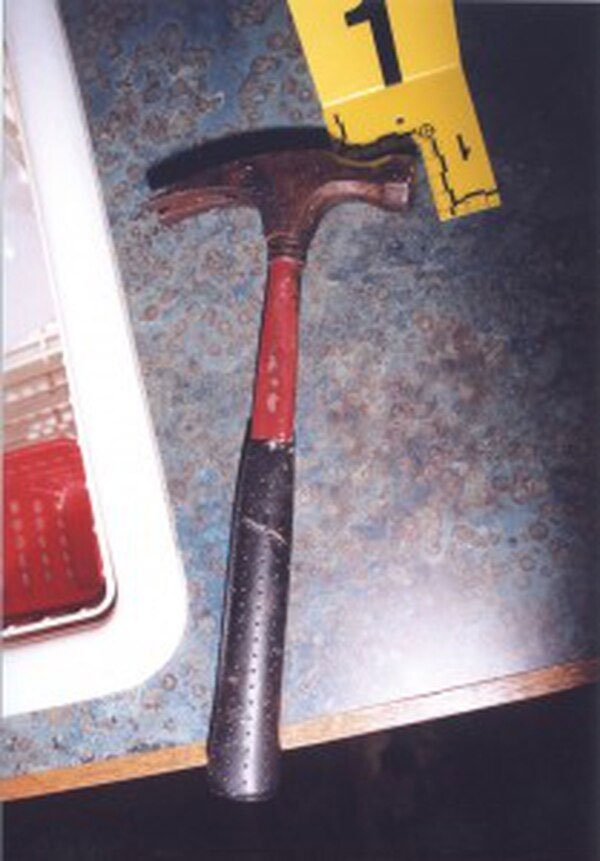red and black claw hammer which the intruder used