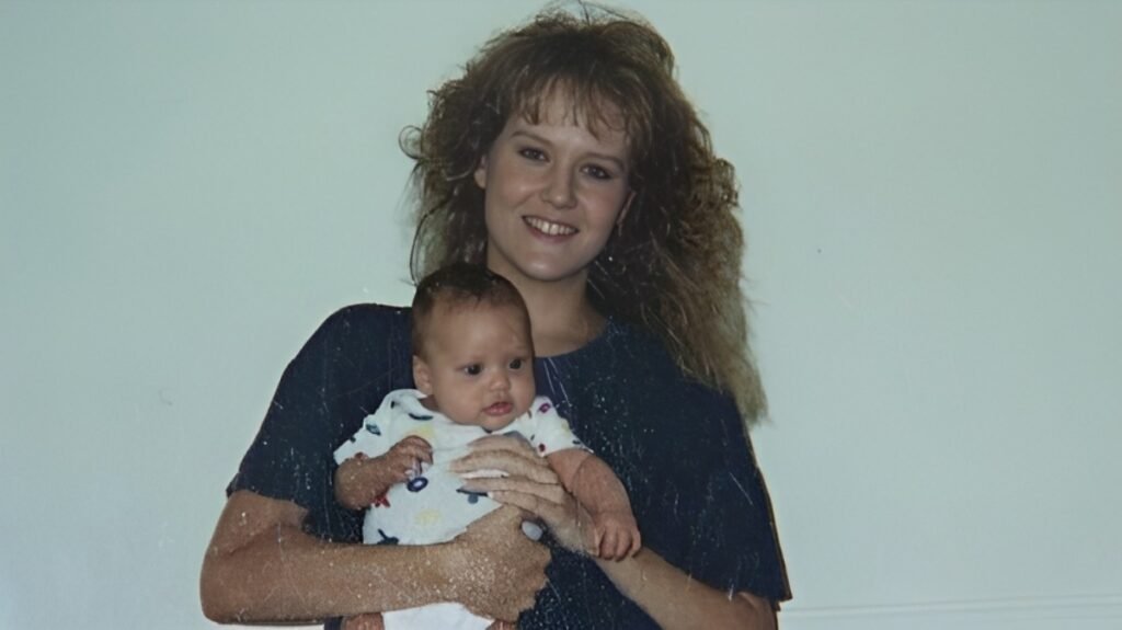 Patti Akins holding her daughter in her arms. 